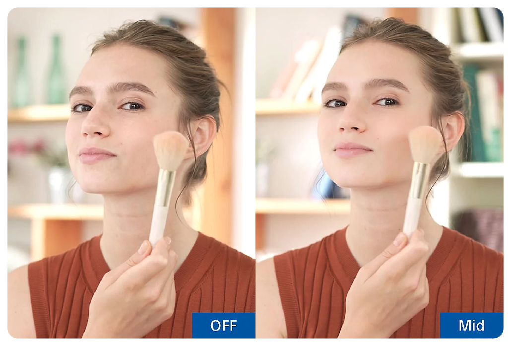 Sony A7 IV sample portait of woman holding makeup brush to her face with soft skin effect on and off 